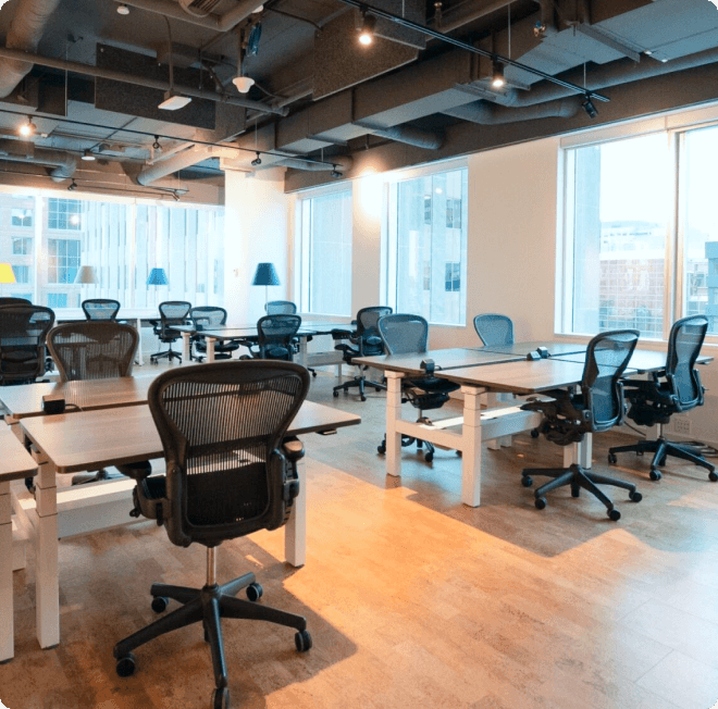 Team office with multiple ergonomic chairs