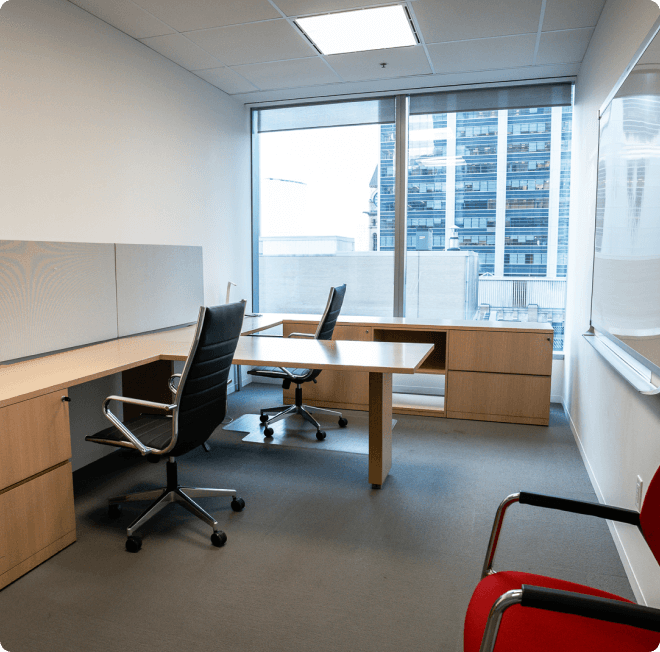Small office with two desks and natural light