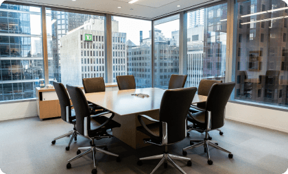 Office reception with a desk and a receptionist
